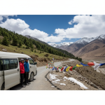 A tempo traveller at Zoji La Pass, the gateway from Kashmir to Ladakh on the epic Srinagar to Leh route - showcasing the adventure behind the fare