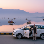 Best taxi rental in Srinagar - premium Innova cab ready for adventure at scenic Dal Lake at sunrise