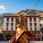 Hemis Festival dates ladakh - monk in colorful Cham mask at Hemis Monastery Ladakh during the two-day celebration