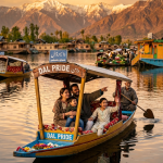 Family trip Kashmir 2026 - happy family of four on shikara ride at Dal Lake golden hour