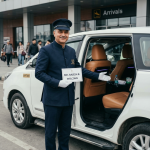 Innova Crysta VIP taxi Srinagar 2026 - professional chauffeur with luxury Innova Crysta at Srinagar Airport arrivals
