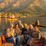 Kashmir group tour from Mumbai for senior citizens 2026 - seniors enjoying shikara ride on Dal Lake