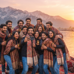 Kashmir group tour packages for friends budget - group of friends enjoying houseboat sunset on Dal Lake with Nature Connect Travels
