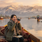 Kashmir travel tips for first timer - happy travelers enjoying shikara ride on Dal Lake with Nature Connect Travels