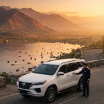 Luxury taxi Kashmir price per day 2026 - Toyota Fortuner premium SUV on Kashmir mountain road with driver