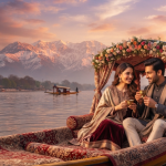 Kashmir tour package for 2 person price - romantic couple on shikara Dal Lake sunset with Nature Connect Travels