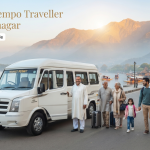 12 seater tempo traveller hire in Srinagar - white Force Tempo Traveller with driver on Boulevard Road along Dal Lake for group travel