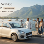Dzire taxi service in Kashmir - white Swift Dzire with driver on Boulevard Road along Dal Lake for couple travel
