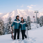 Gulmarg skiing package for couples showing romantic ski holiday with Gondola and Apharwat Peak views