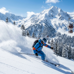 Gulmarg winter skiing package by Nature Connect Travels showing skier on powder slopes with Gondola