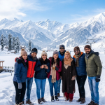 Kashmir group tour winter packages by Nature Connect Travels showing travelers on snow in Gulmarg with Gondola