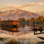 Kashmir tour plan by Nature Connect Travels showing Dal Lake houseboat and Shikara at golden hour